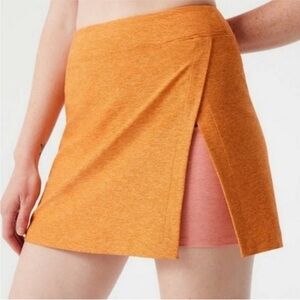 Outdoor Voices Court Skort in Canyon / Nectarine